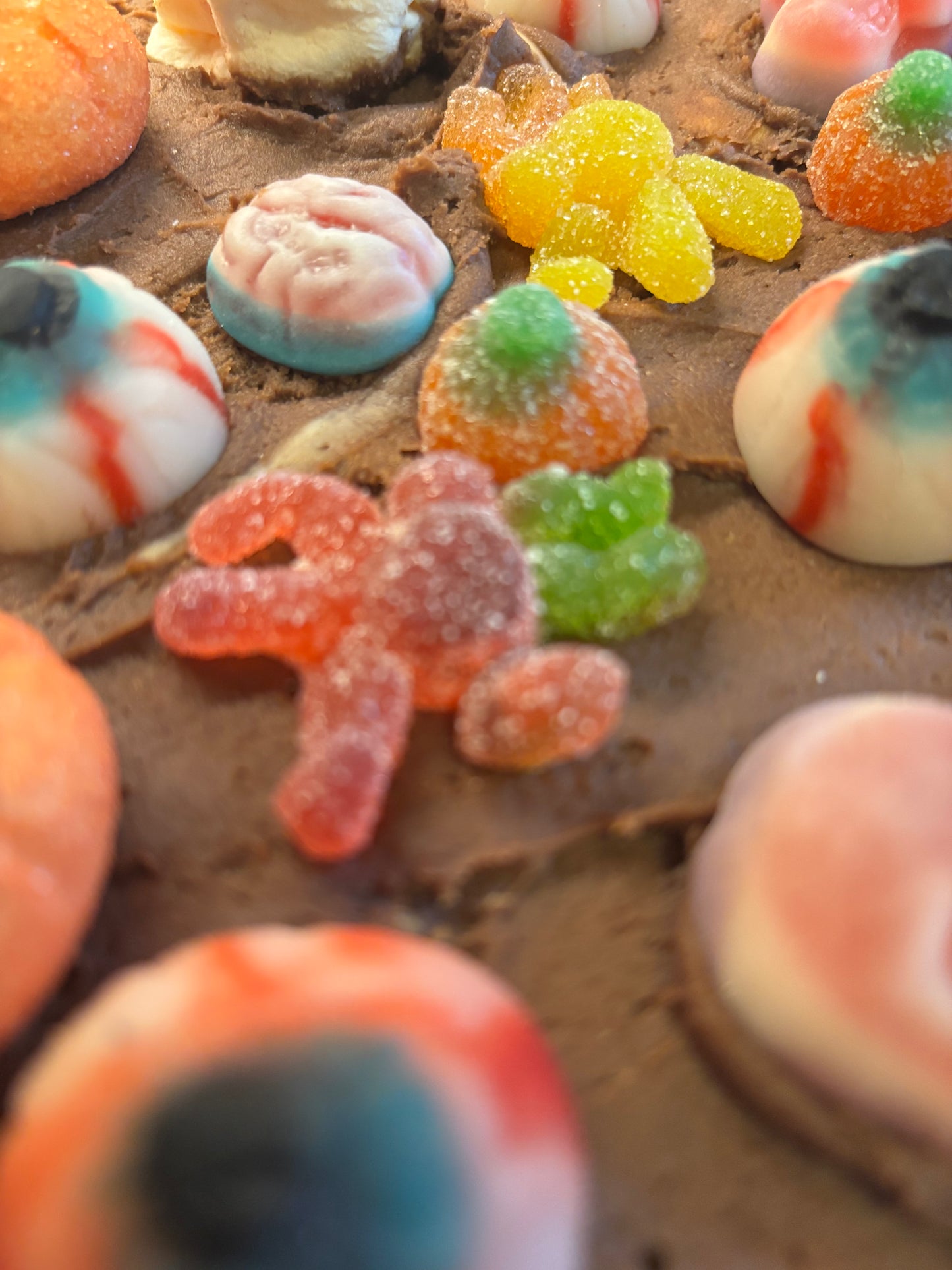 chocolate brownies with Halloween candy decorations 