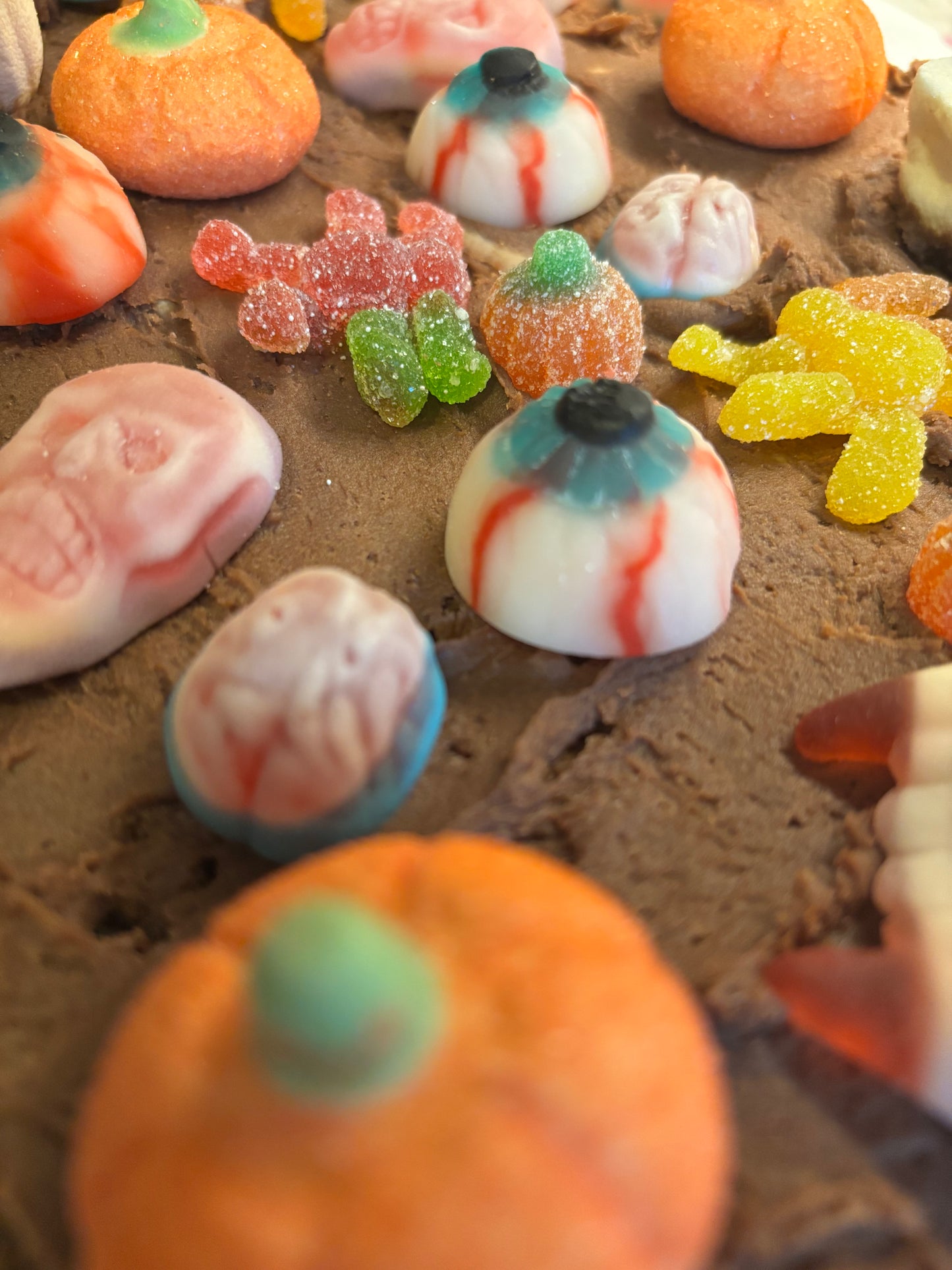 Halloween-themed candy on a chocolate brownie